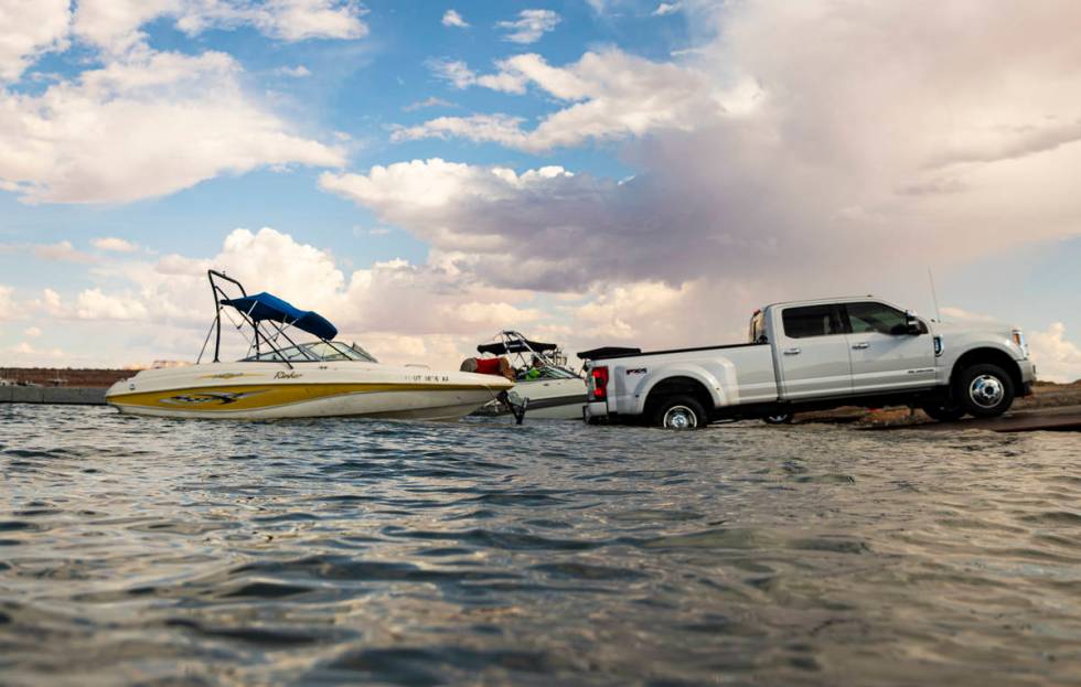 Randy Wendt, of Big Water, Utah, prepares to take his boat out of the water at the Wahweap main ...