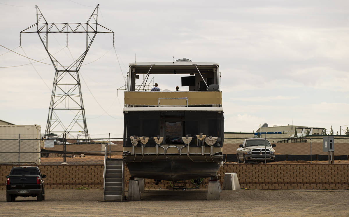 A dry-docked houseboat, which can no longer be launched at the last remaining launch ramp at th ...