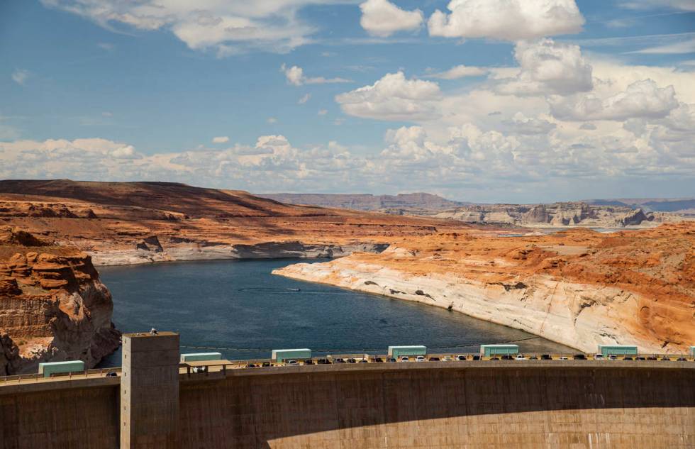 A view of Lake Powell and the Glen Canyon Dam in the Glen Canyon National Recreation Area on Tu ...