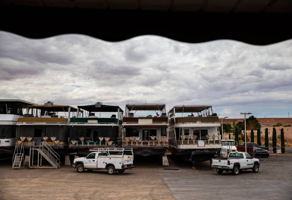 Dry-docked houseboats, which can no longer be launched at the last remaining launch ramp at the ...