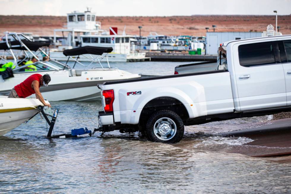Randy Wendt, of Big Water, Utah, prepares to take his boat out of the water at the Wahweap main ...