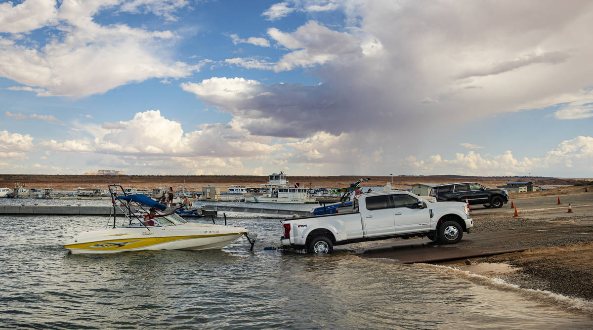 Randy Wendt, of Big Water, Utah, prepares to take his boat out of the water at the Wahweap main ...