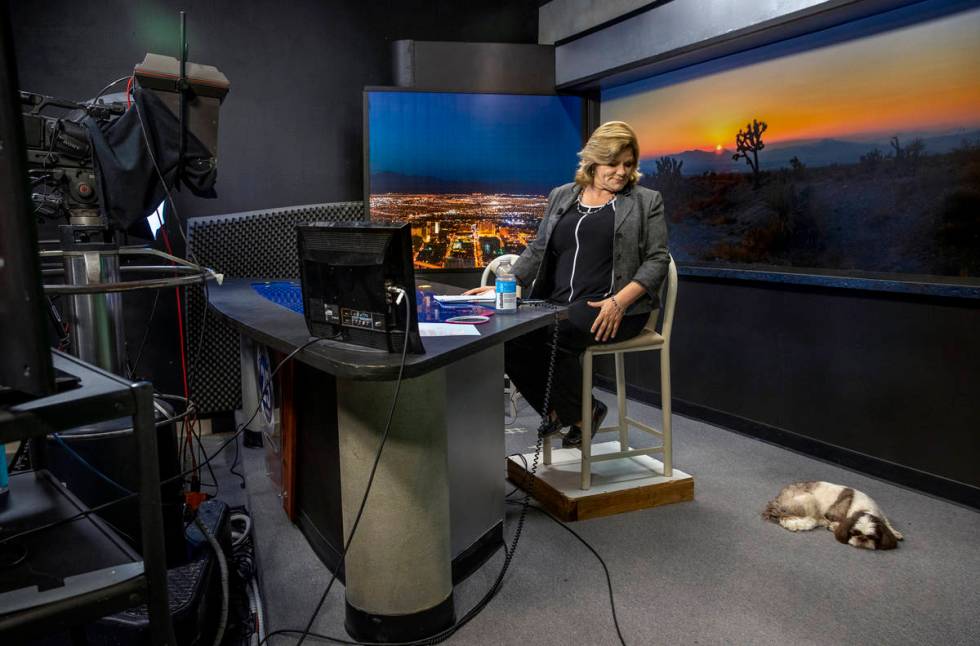 KPVM 25 News Director/Anchor Deanna O'Donnell looks her dog Tommy on set as she preps for her b ...