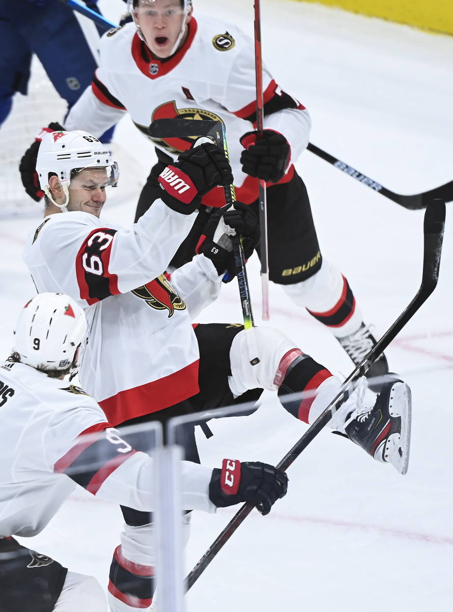 Ottawa Senators right wing Evgenii Dadonov (63) celebrates after he scored the winning goal aga ...