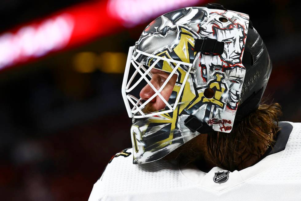 Golden Knights goaltender Robin Lehner (90) looks on during a break the second period of an NHL ...