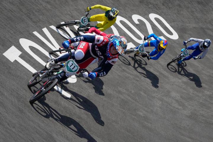 Connor Fields of the United States, center, leads with Anthony Dean of Australia, above, Carlos ...