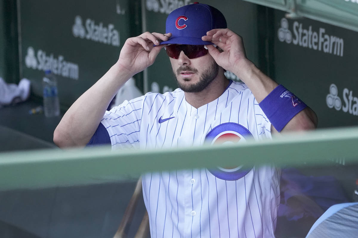 Chicago Cubs' Kris Bryant heads to the clubhouse after a 7-4 loss to the Cincinnati Reds in a b ...