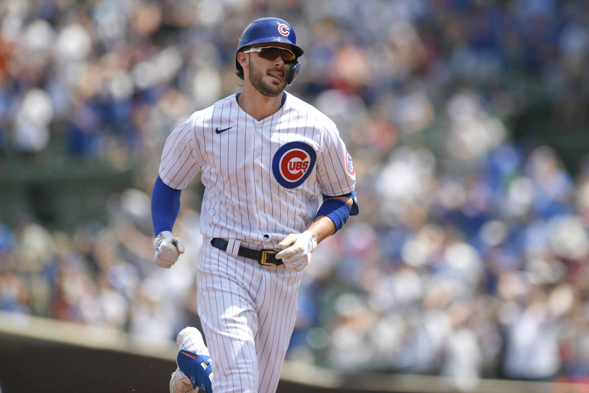 Chicago Cubs' Kris Bryant rounds the bases after hitting a two-run home run during the first in ...