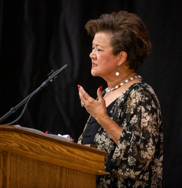 Gloria Caoile, president of the Asian Pacific American Labor Alliance, speaks during a public m ...