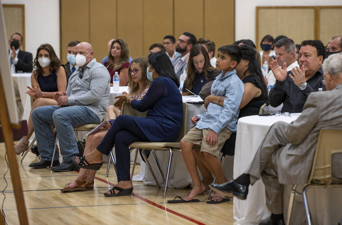 Family and friends applaud another performance during a public memorial service for former Metr ...