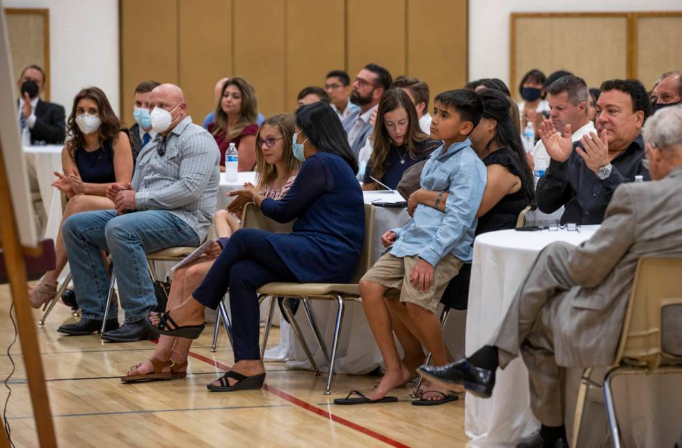 Family and friends applaud another performance during a public memorial service for former Metr ...