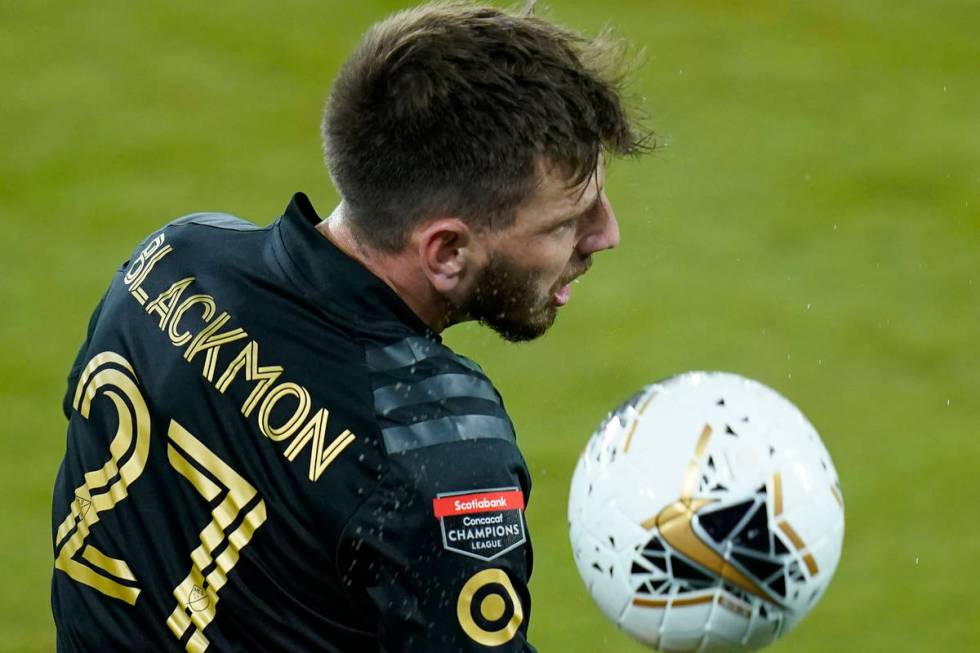 Los Angeles FC defender Tristan Blackmon (27) gets position on the ball in front of Tigres midf ...