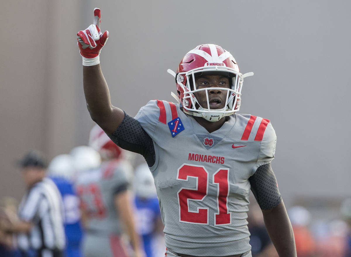 Mater Dei senior running back Sean Dollars (21) celebrates after scoring a second quarter touch ...