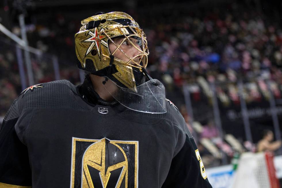 Golden Knights goaltender Marc-Andre Fleury (29) skates around the goal during the second perio ...