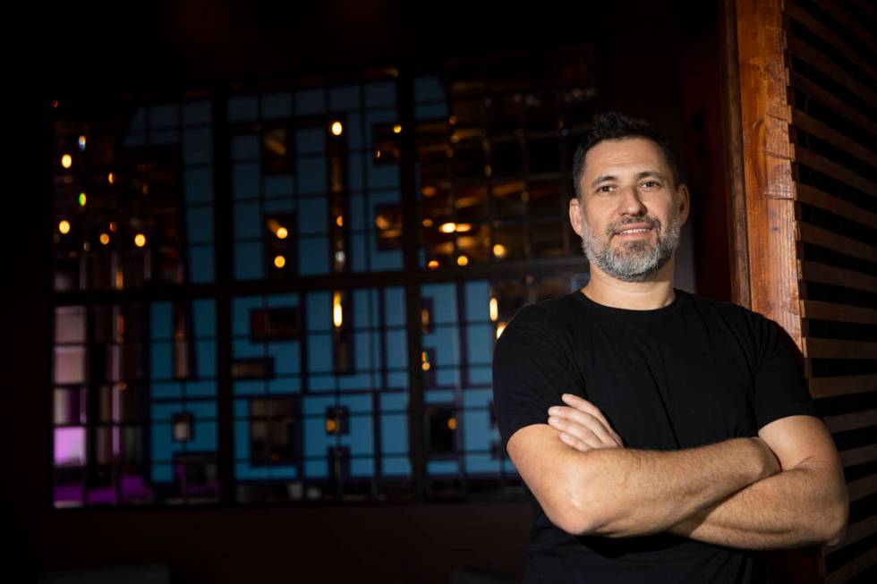 Bar manager Carlos Sanchez poses for a portrait at The Usual Place music venue in Las Vegas, Fr ...