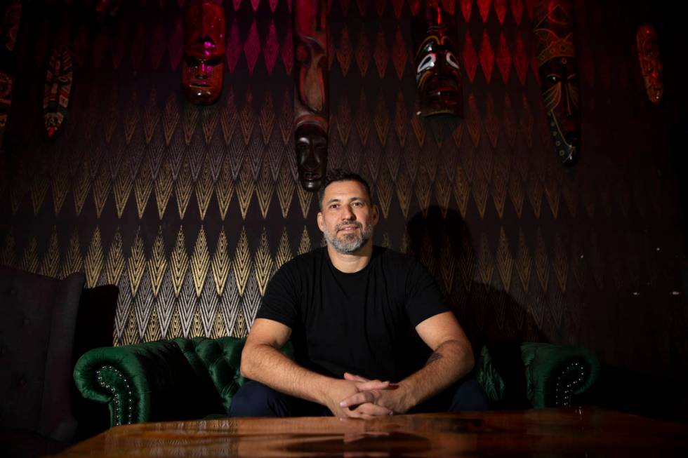 Bar manager Carlos Sanchez poses for a portrait at The Usual Place music venue in Las Vegas, Fr ...