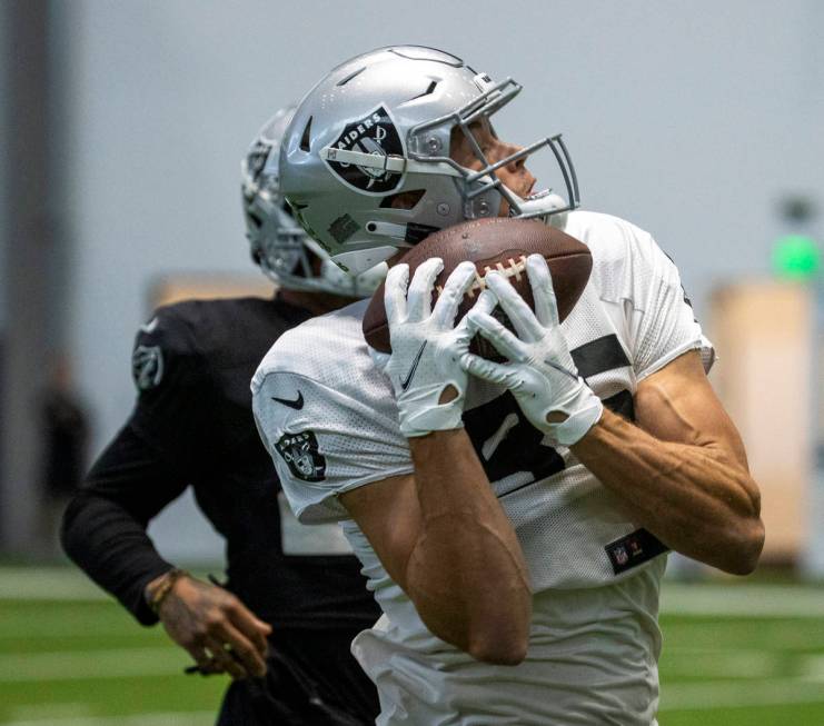 Raiders tight end Derek Carrier (85) secures a catch during practice at the Intermountain Healt ...