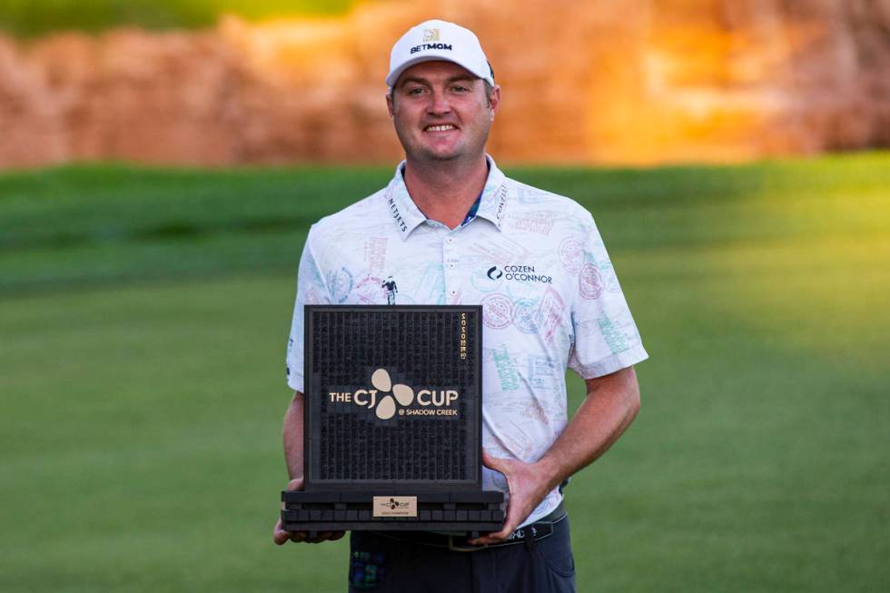 Jason Kokrak celebrates with the trophy after winning the CJ Cup at the Shadow Creek Golf Cours ...
