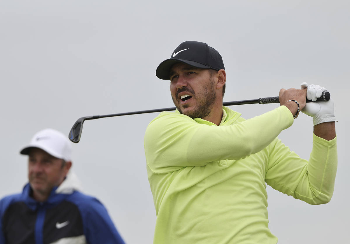 United States' Brooks Koepka tees off the 11th hole during a practice round for the British Ope ...