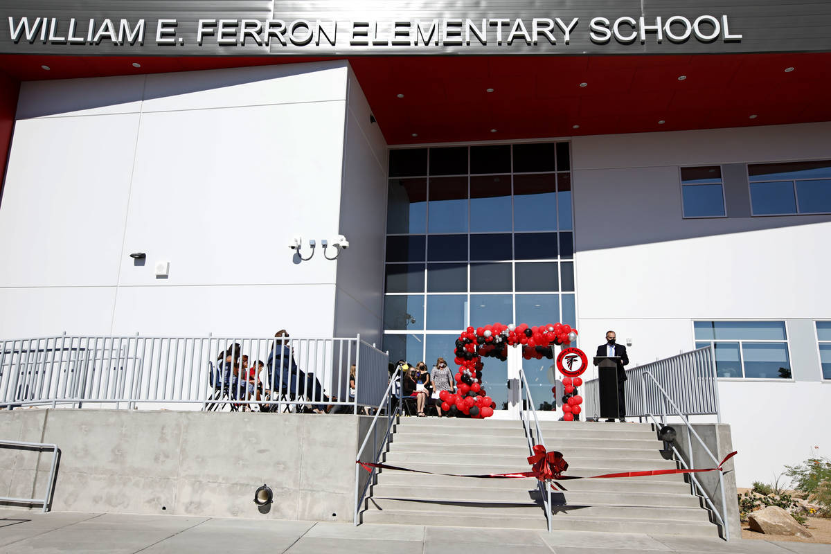Clark County School District Superintendent Jesus Jara, right, speaks during a ribbon cutting c ...