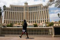 Pedestrian walk past the Bellagio on Friday, Aug. 28, 2020, in Las Vegas. (Bizuayehu Tesfaye/L ...