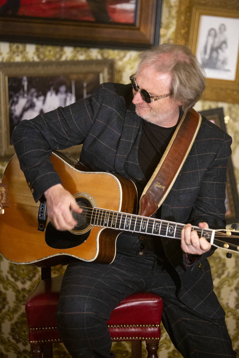 Dave Brown of The Black Donnellys, a local Irish music duo, plays while filming a documentary a ...