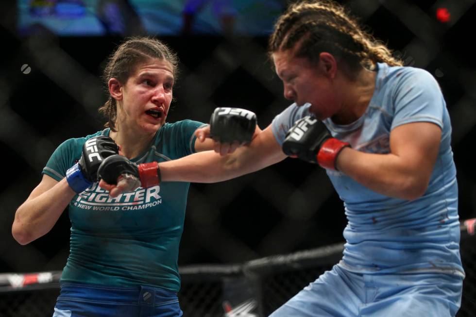 Roxanne Modafferi, left, fights Nicco Montano during a women's flyweight title bout at the Par ...