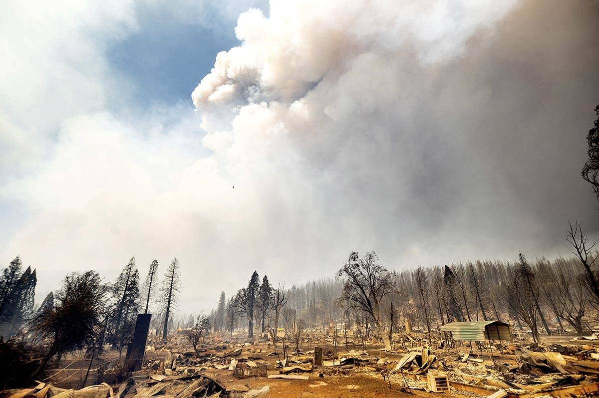 A photo shows homes destroyed by the Dixie Fire line central Greenville on Thursday, Aug. 5, 20 ...