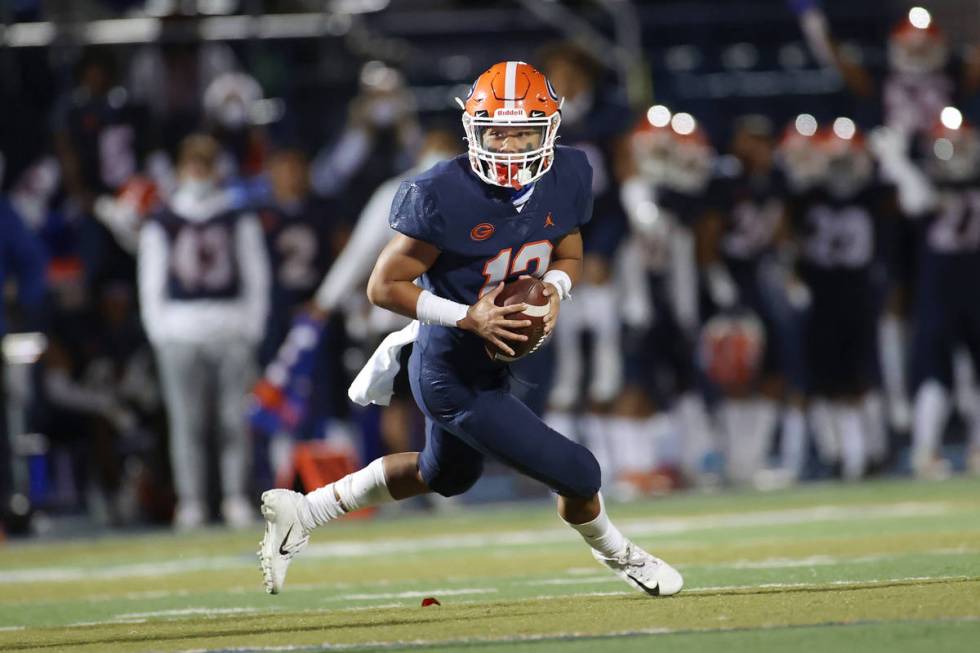 Bishop Gorman's Micah Alejado (12) looks for an open pass against Faith Lutheran during the sec ...