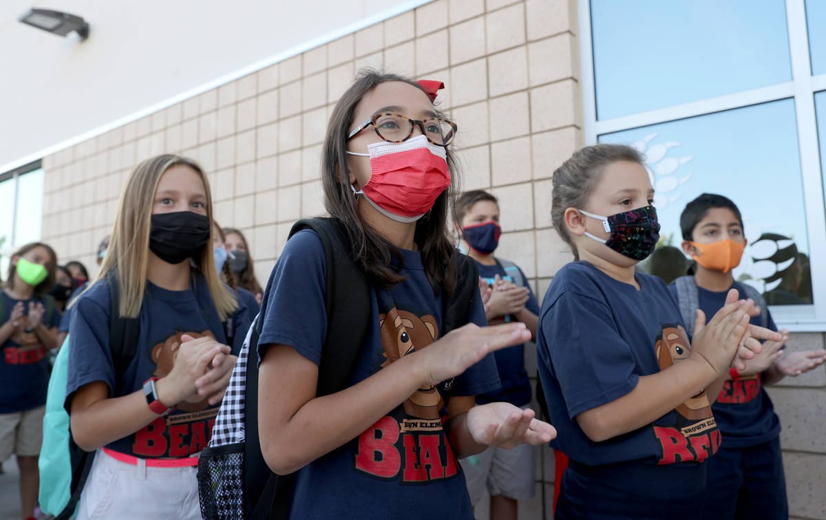 Reagan Menard, 10, from left, Ella Scott, 10, and Lucy Rodriguez, 9, during a ribbon-cutting ce ...