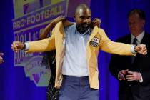 Charles Woodson, a member of the Pro Football Hall of Fame Class of 2021, receives his gold jac ...