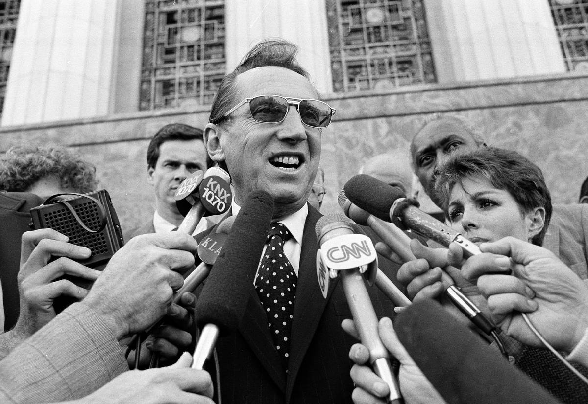 FILE - Los Angeles Raiders' owner Al Davis speaks to the media after a Federal Court jury ruled ...
