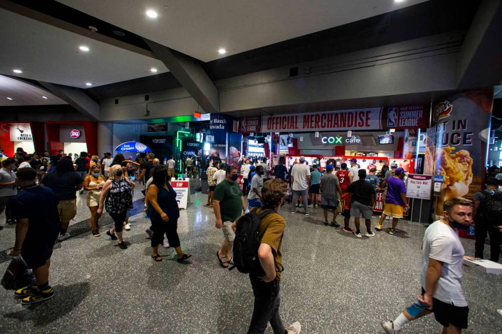 Basketball fans walk the concourse during the NBA Summer League at the Thomas & Mack Center ...
