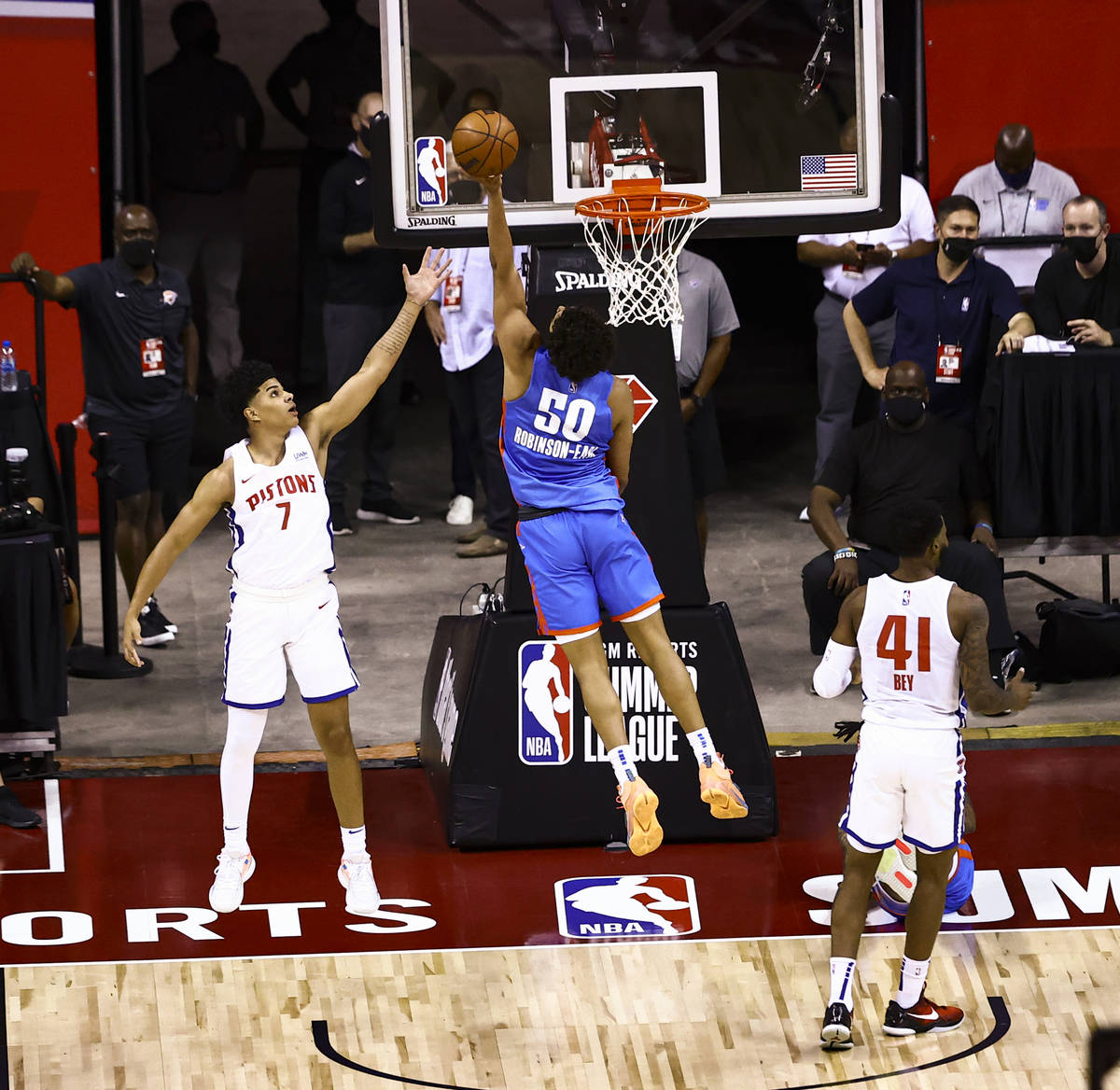 Oklahoma City's Jeremiah Robinson-Earl (50) goes to the basket against Detroit's Killian Hayes ...