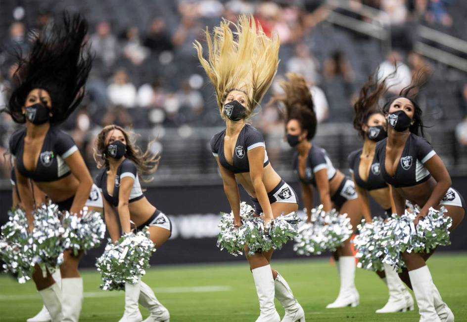 The Las Vegas Raiderettes perform during a special training camp practice for season ticket hol ...