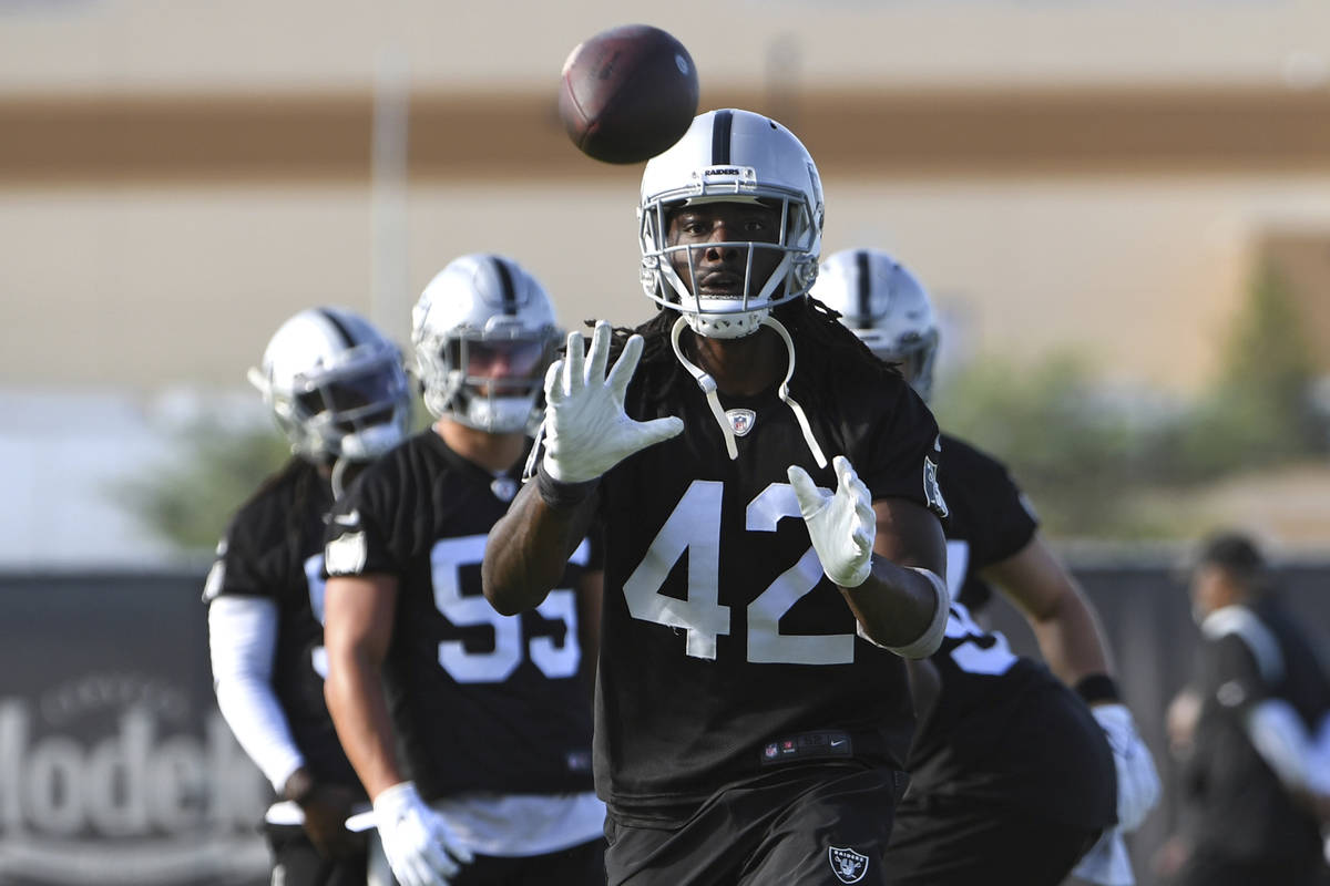 Las Vegas Raiders linebacker Cory Littleton performs drills during an NFL football practice Wed ...