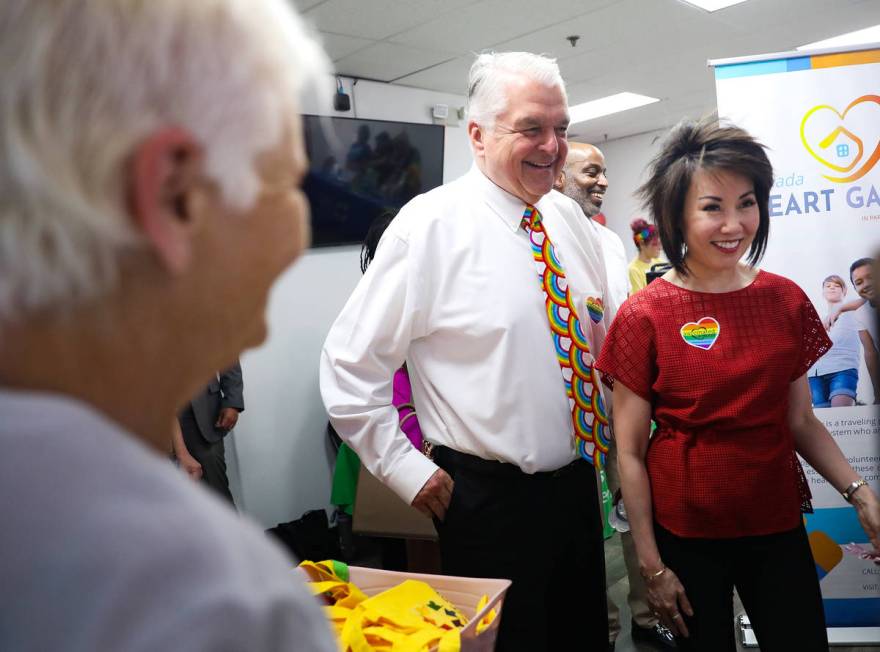 Gov. Steve Sisolak greets vendors alongside his wife Kathy Sisolak as they tour the Henderson E ...