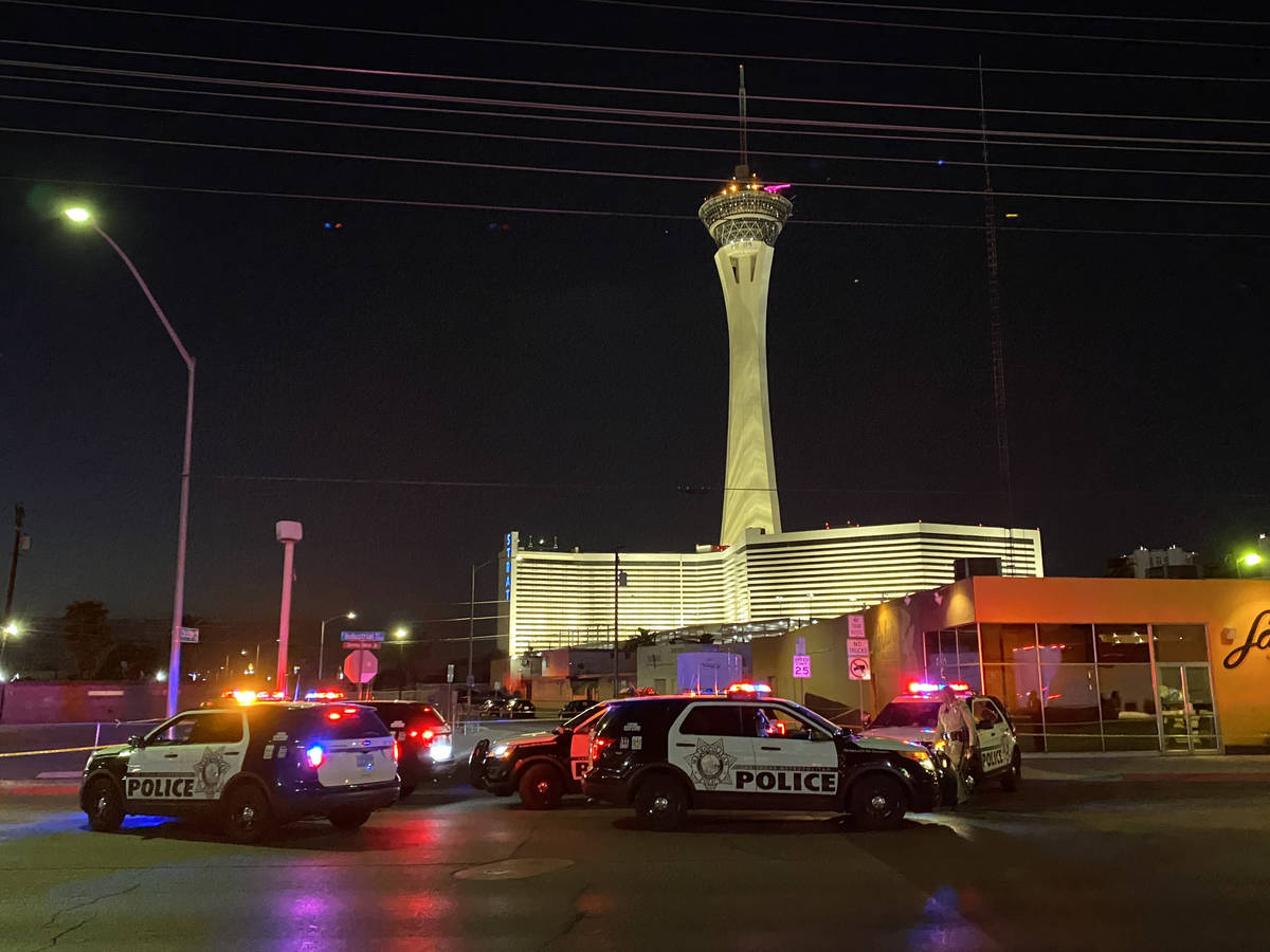 Las Vegas police investigate a double homicide on Chicago Avenue in Las Vegas, Tuesday, Aug. 10 ...