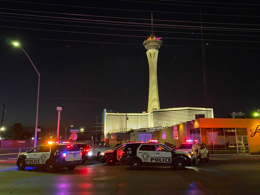 Las Vegas police investigate a double homicide on Chicago Avenue in Las Vegas, Tuesday, Aug. 10 ...