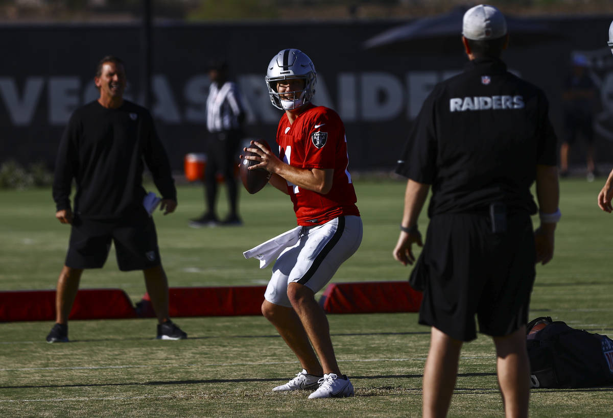 Raiders quarterback Case Cookus looks to pass during training camp at Raiders Headquarters/Inte ...