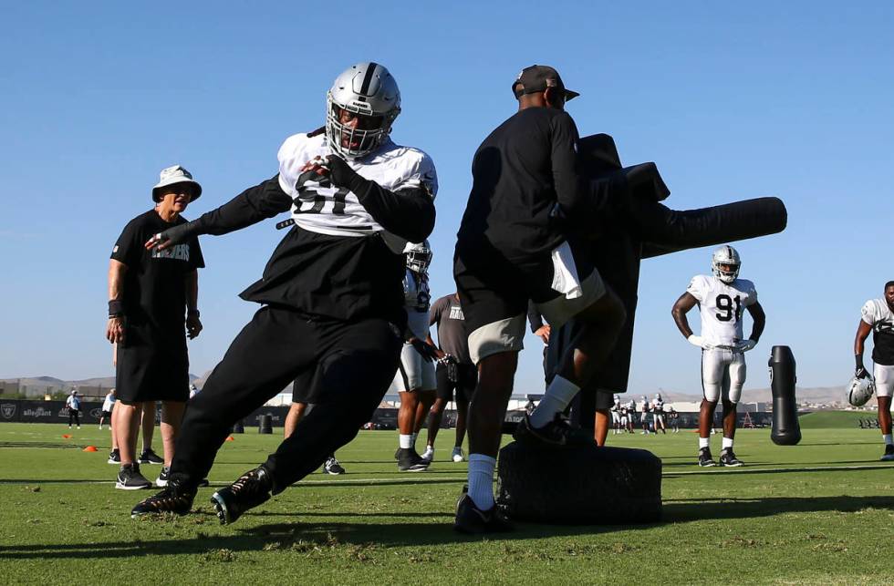 Raiders defensive tackle Gerald McCoy participates in a drill during training camp at Raiders H ...
