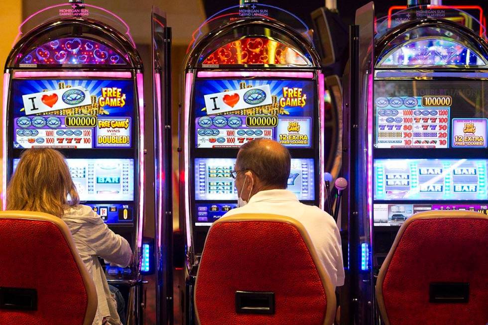 Guests gamble at the Mohegan Sun Casino at Virgin Hotels Las Vegas on Friday, April 30, 2021, i ...