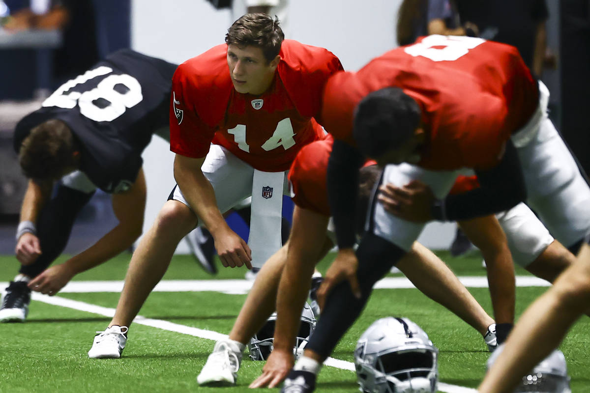 Raiders quarterback Case Cookus (14) stretches during training camp at Raiders Headquarters/Int ...
