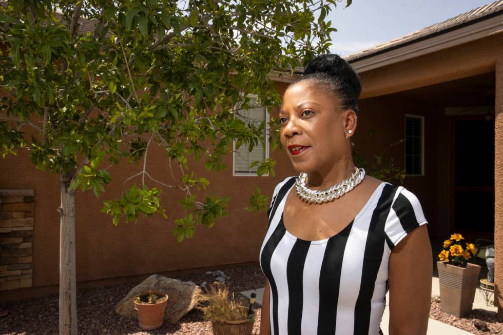 Teresa Washington poses for a portrait at her home in the Burson Ranch community in Pahrump, We ...