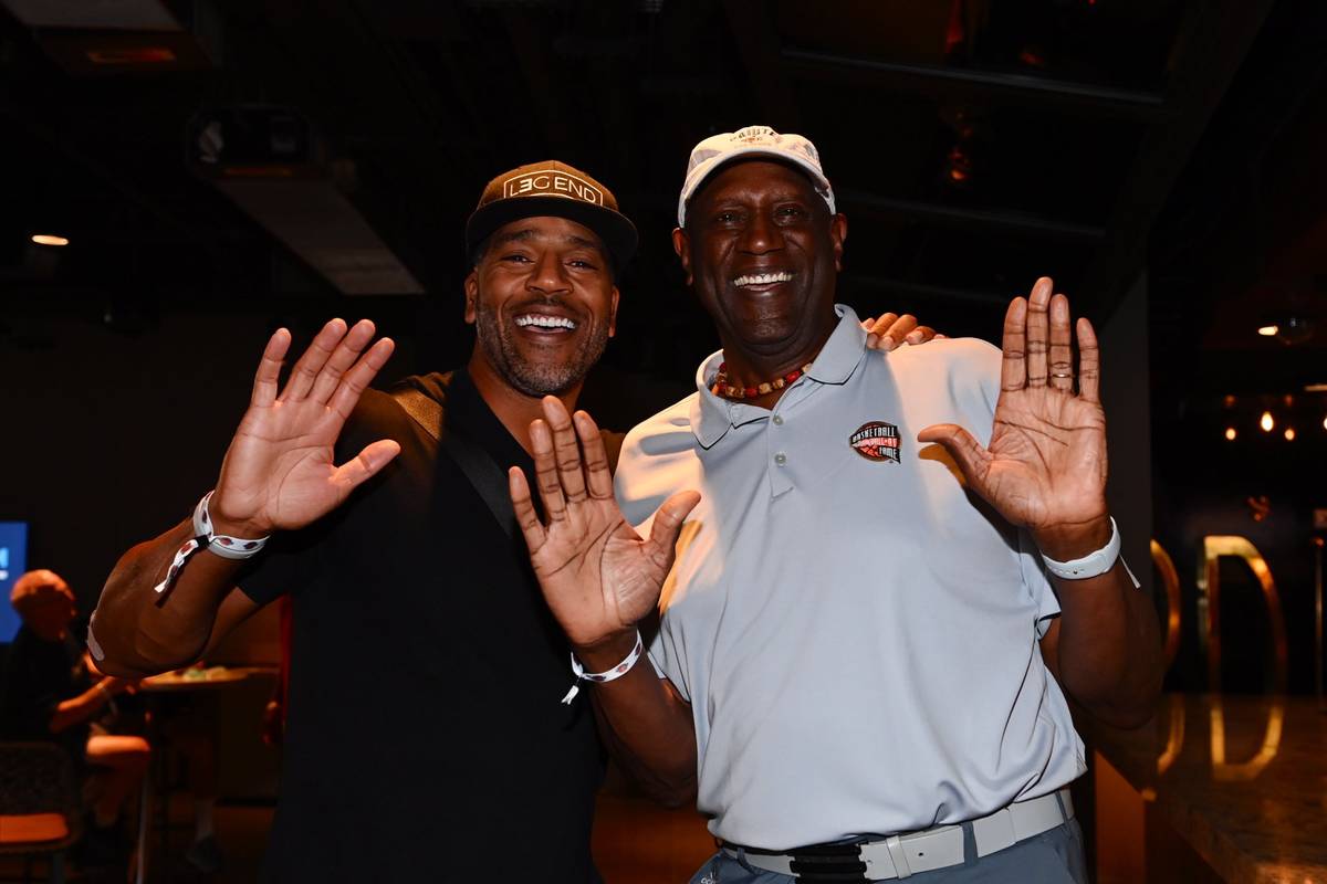 Retired NBA players Jim Jackson (left) and Spencer Haywood (right) pose for a photo during the ...