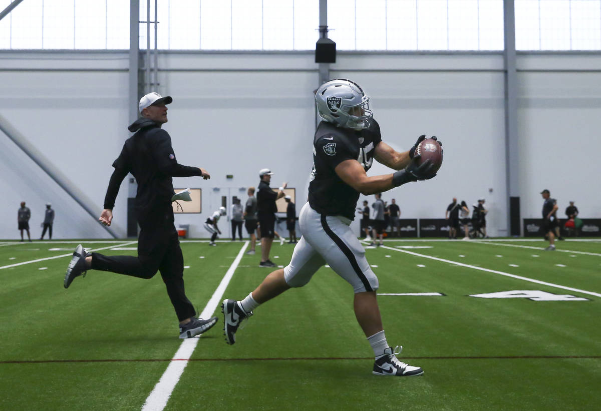 Raiders'Alec Ingold catches a pass while participating in individual drills during training cam ...