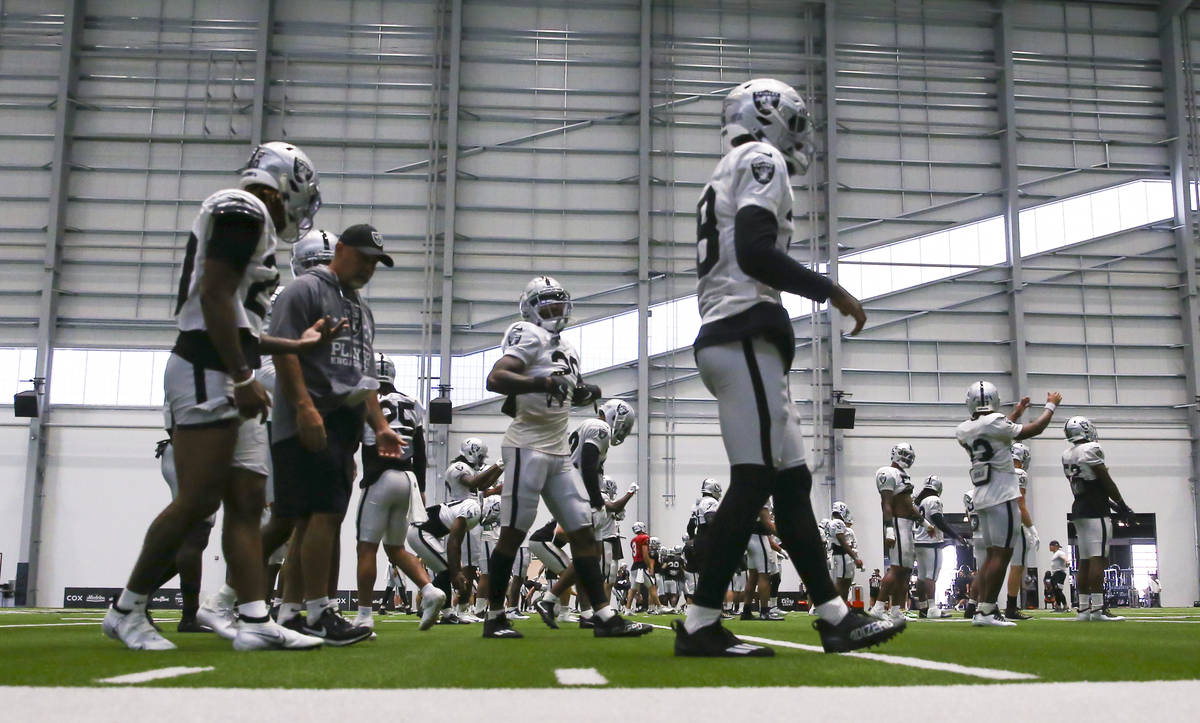 Raiders players warm up during training camp at Raiders Headquarters/Intermountain Healthcare P ...