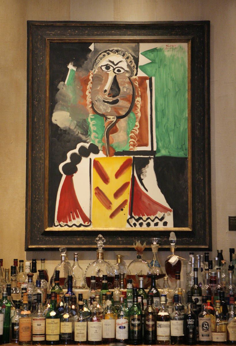 Pablo Picasso's painting "Bust of a Man" hangs on the wall at Picasso, a five-diamond ...