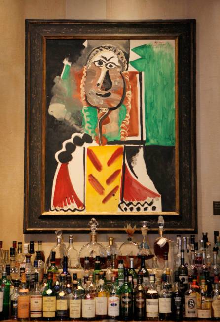 Pablo Picasso's painting "Bust of a Man" hangs on the wall at Picasso, a five-diamond ...