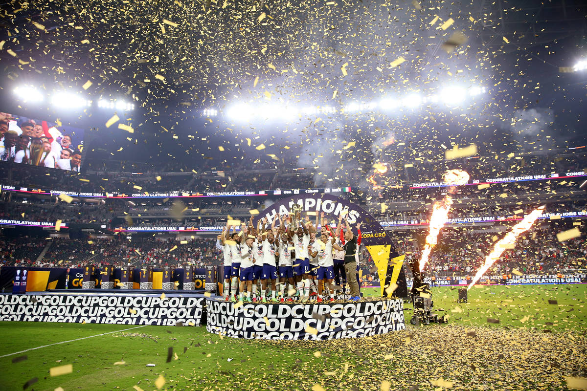 The United States celebrate their victory in the Concacaf Gold Cup final against Mexico at Alle ...